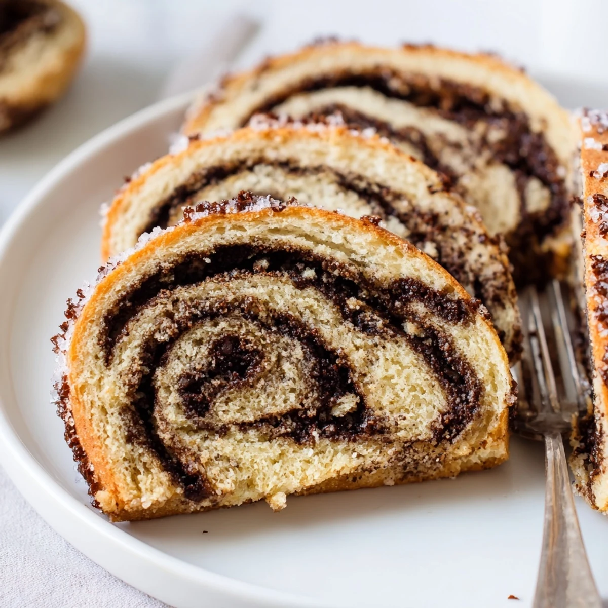 Golden brown, buttery festive Hanukkah Kokosh Christmas cookies drizzled with colorful sprinkles.