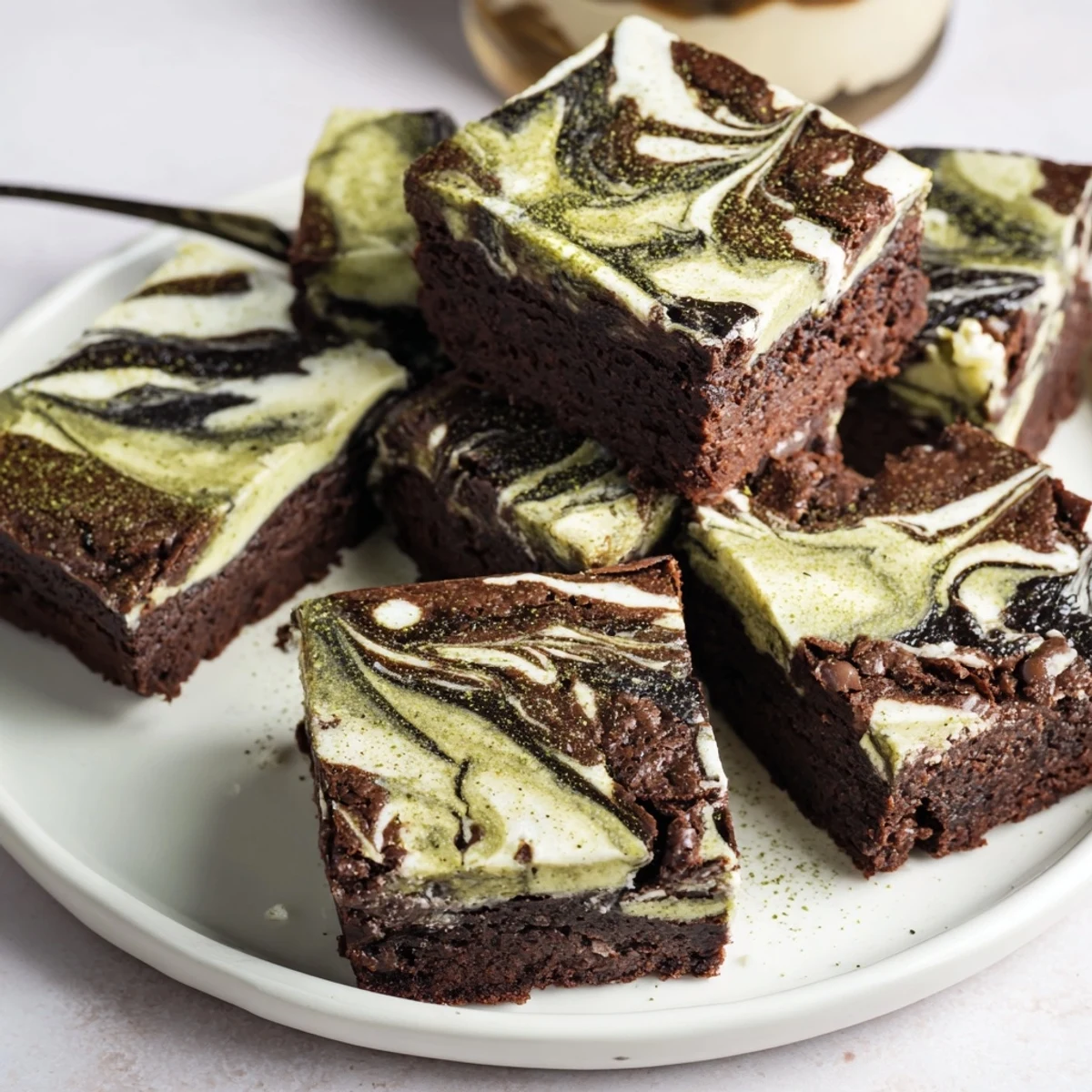 Decadent matcha-miso brownies cooling on a wire rack for dessert lovers.  