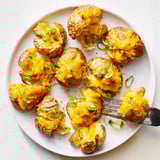 Savory smashed green onion potato bombs, ideal for parties or cozy dinners.  