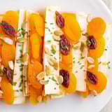 Imagine the Serengeti Sunset: sweet apricots and Gouda cheese create a beautiful appetizer presentation.