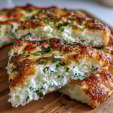 Golden-bubbled Fluffy Cottage Cheese Flatbread topped with feta, ready for a quick lunch wrap.