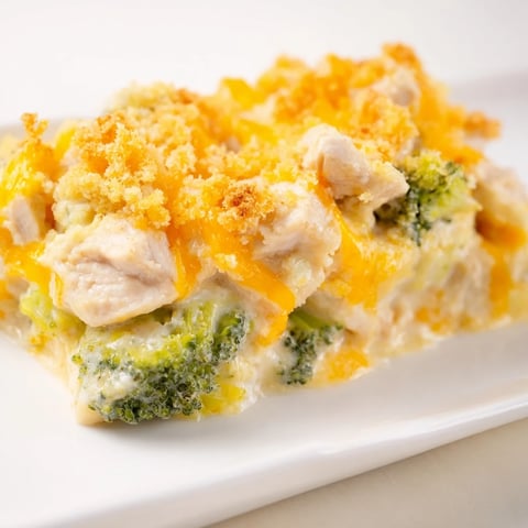 Golden, bubbly Chicken & Broccoli Cheddar Bake with a crispy panko topping, ready to serve.