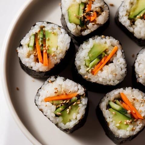 Avocado Cucumber Sushi rolls, showcasing fresh ingredients, ideal for a light, healthy meal or appetizer.