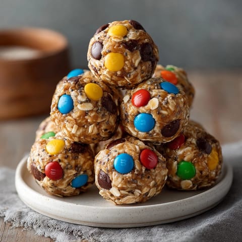 Homemade Monster Mash Protein Balls: vibrant oats, peanut butter, and chocolate combine for an energizing treat.
