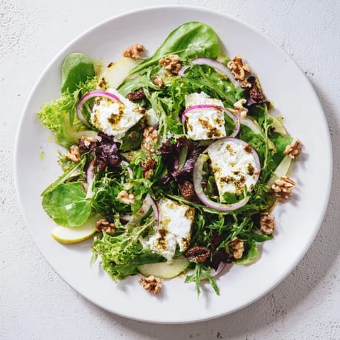 This Spiced Honey and Date Goat Cheese Salad shows off a vibrant salad with a luscious honey dressing.